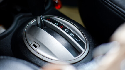 Detail of car interior. Automatic transmission indicators, next to the automatic transmission lever.