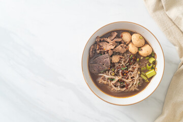 Thai noodle with pork, stewed pork, meatball and pork liver in blood soup