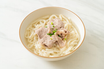 udon noodles with pork in clear soup