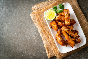 Fried Snapper Belly on white plate