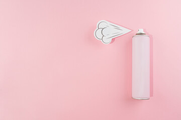 pink spray can on a pink background. hairspray. Schematic spraying