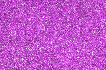 Purple glitter texture background.  New Year, Christmas and all celebration background concepts. 
