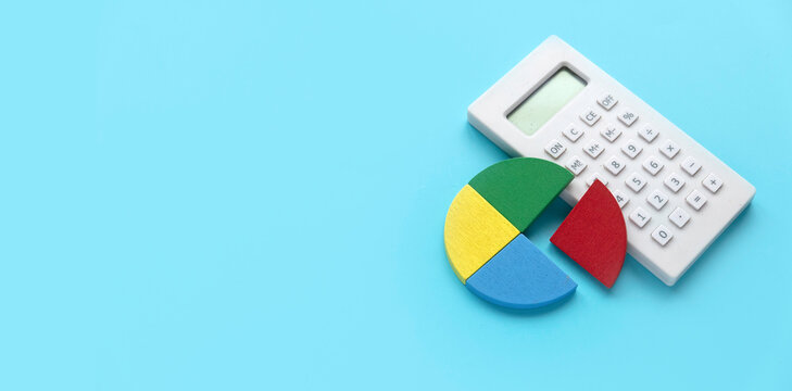 Quarterly report concept.Company financial report.Business charts. Calculator and pie chart.