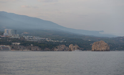 Summer boat trip to the rocks of Adalary and Mount Ayu-Dag (Bear) in the village of Gurzuf. Crimea, Russia. 31.08.2023