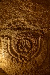 Close up of the carving on the other end of the sarcophagus with the menorah on it  in the newly opened area in the Cave of the Coffins at Bet She'arim in Kiryat Tivon, Israel.

