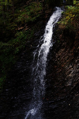 Zhenetsky Huk waterfall in Ukraine. a beautiful waterfall 15 meters long. Waterfall with rock ledges