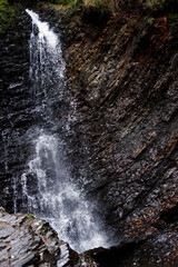 Zhenetsky Huk waterfall in Ukraine. a beautiful waterfall 15 meters long. Waterfall with rock ledges