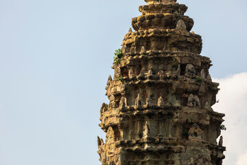 Stone pagoda or tower, decorated with reliefs and horn details at the temple of Angkor Wat, Cambodia