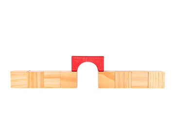 Bridge the gaps between the wooden blocks with a red wooden bridge. Coordination, Networking, Conflict Management or mediation. Isolated on white background. PNG