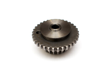 Car chain tensioner sprocket on isolated white background. New spare part.