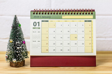 Hello January. January 2024 calendar for planning on the table. - obrazy, fototapety, plakaty