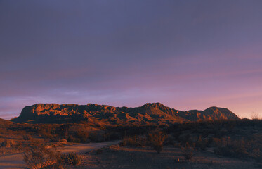 Sunset Fades To Pink and Orange Over The Western Side Of The Chisos Mountains
