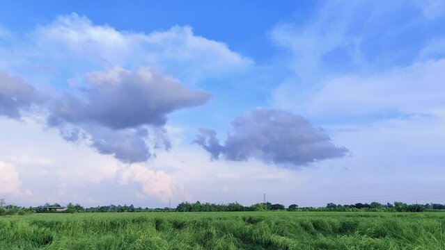 4K Time lapse of beautiful air atmosphere bright blue sky weather nature background abstract clear texture with white clouds summer sun day.