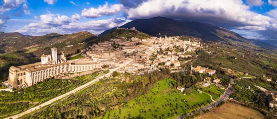 Foto op Canvas Italy . Impressive medieval Assisi town in Umbria and religious place.  aerial drone panoramic view. italian travel and best destinations. © Freesurf