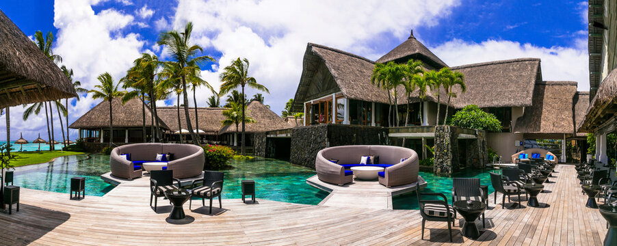 luxury 5 star hotel territory with swimming pool and bar zone - Constance Belle Mare Plage. Mauritius island. Pointe de flacq , Belle Mare. February 2020