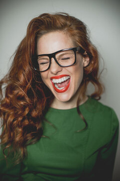 portrait of a ginger, red hair laughing woman, person