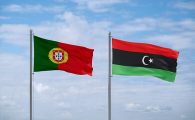 Libya and Portugal flags, country relationship concept