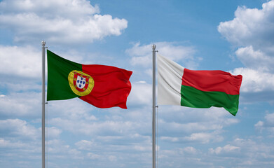 Madagascar and Portugal flags, country relationship concept