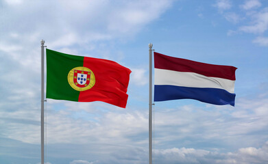 Netherlands and Portugal flags, country relationship concept