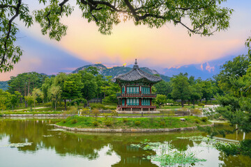 Sunset at the Hyangwonjeong Pavilion in the center of the pond in the Gyeongbokgung palace