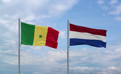 Netherlands and Senegal flags, country relationship concept