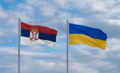 Ukraine and Serbia flags, country relationship concept