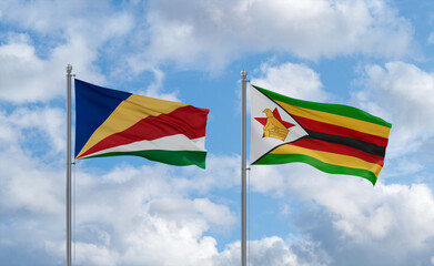 Zimbabwe and Seychelles flags, country relationship concept