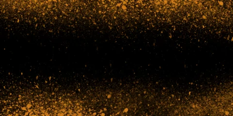 Fotobehang Abstract shiny golden glitter is falling randomly on black background perfect for design, presentation, holiday, weeding card and decoration related works. © MUHAMMAD TALHA