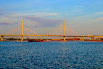 Fototapeta na wymiar Cable-stayed bridge in St. Petersburg, Russia. A modern highway (Western High-Speed Diameter) passes over this bridge.