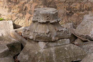 Old plaster sculptures and bas-reliefs, wall texture and patterns. Elements of architectural decorations of buildings. On the streets in Istanbul, public places.