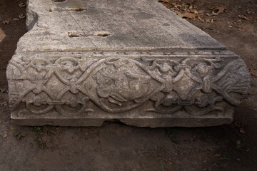 Old plaster sculptures and bas-reliefs, wall texture and patterns. Elements of architectural decorations of buildings. On the streets in Istanbul, public places.