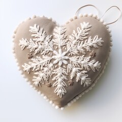 A heart shaped ornament with snowflakes on it. Stuffed cotton heart with snow flakes embroidery.