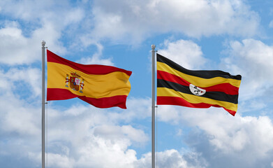Uganda and Spain flags, country relationship concept