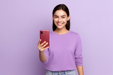 Fototapeta premium young happy woman wears a t-shirt with mallow sleeves