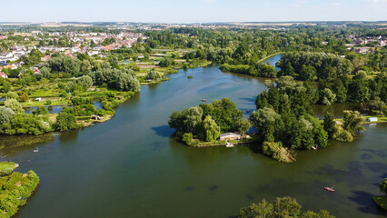 Fototapeta na wymiar Aerial view of the Hortillonnages of Amiens made of several islands covered with gardens sheds and plantations in a swampy area of the river Somme in Picardie, France