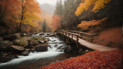 Rustic Wooden Bridge Over a Serene Mountain Stream in Autumn