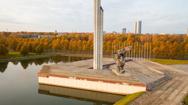 Aerial photo from drone to of Victory Monument In Riga (Uzvaras Piemineklis), golden autumn. World War II Victory Monument to Soviet Army in Riga. Riga, Latvia, Europe  

