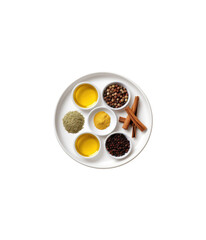 kitchen spices in a white plate. isolated on white background PNG.