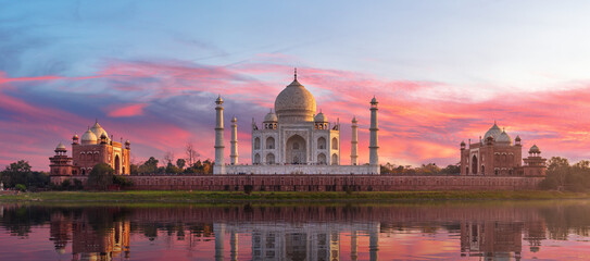 Famous Taj Mahal on sunset, view from the river Yamuna, Agra, India - obrazy, fototapety, plakaty