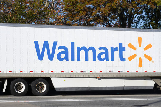 New Rochelle, NY - October 28, 2023: Walmart cargo trailer with trademark logo on highway with motion blur