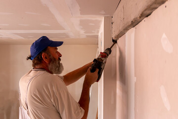 Construction or renovation of apartments.  Home renovation workers crew. Builders apartment...