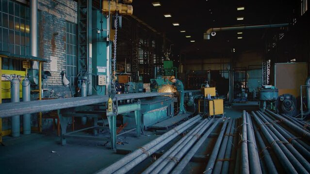 Worker at work in a metal carpentry