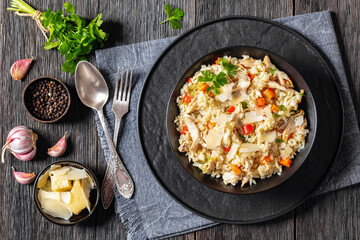 Chicken Fried Rice with vegetables in black bowl