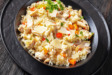 Chicken Fried Rice with vegetables in black bowl