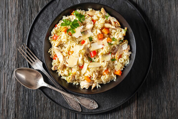Chicken Fried Rice with vegetables in black bowl