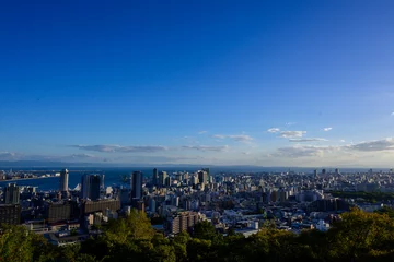 Foto op Canvas 晴れた日の午後、神戸の高台ヴィーナスブリッジより神戸市街地の景観。 © 宮岸孝守