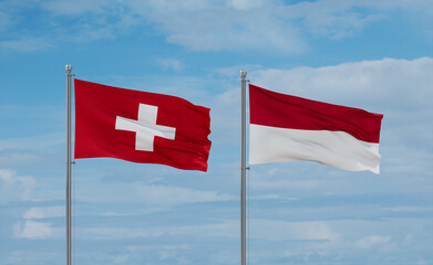 Indonesia and Switzerland flags, country relationship concept