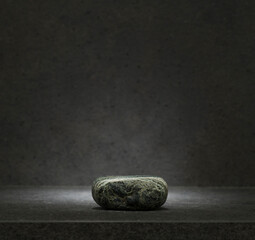 stones on a dark gray background for the podium. stones with texture for product presentation....