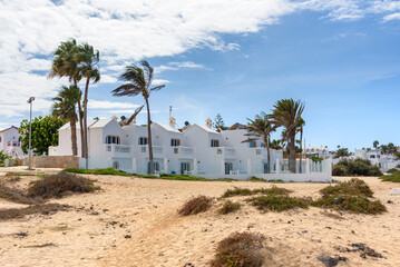 Picturesque residential buildings at the beach in Corralejo