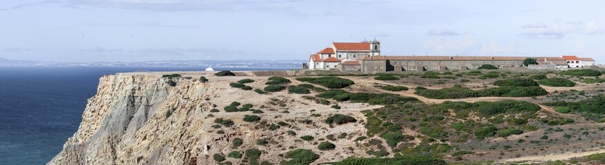Fototapeta premium Panoramic landscape over the Sanctuary of Our Lady of Cabo Espichel, located at the westernmost point of the coast of Sesimbra, Portugal